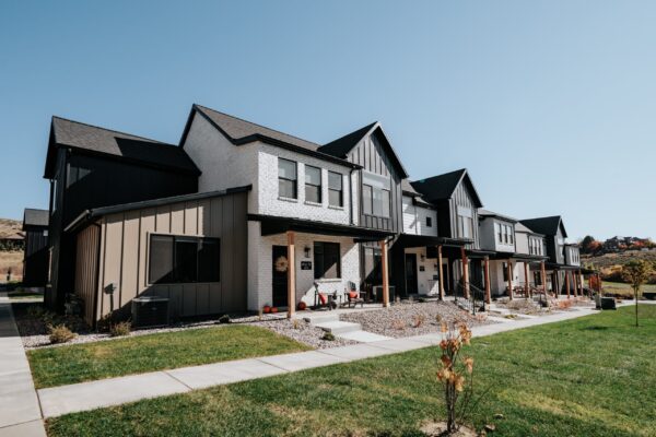 Front Porch to our Townhomes with lots of grass area